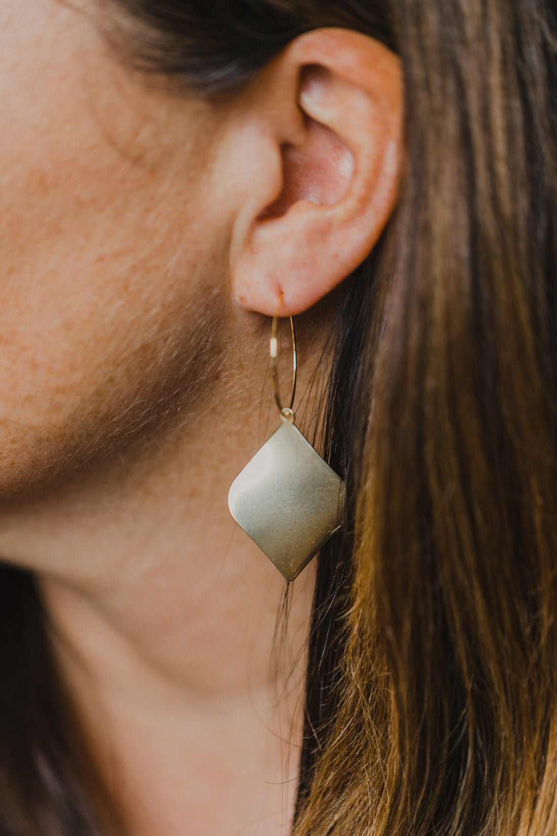 Hoop earrings with diamond pendant
