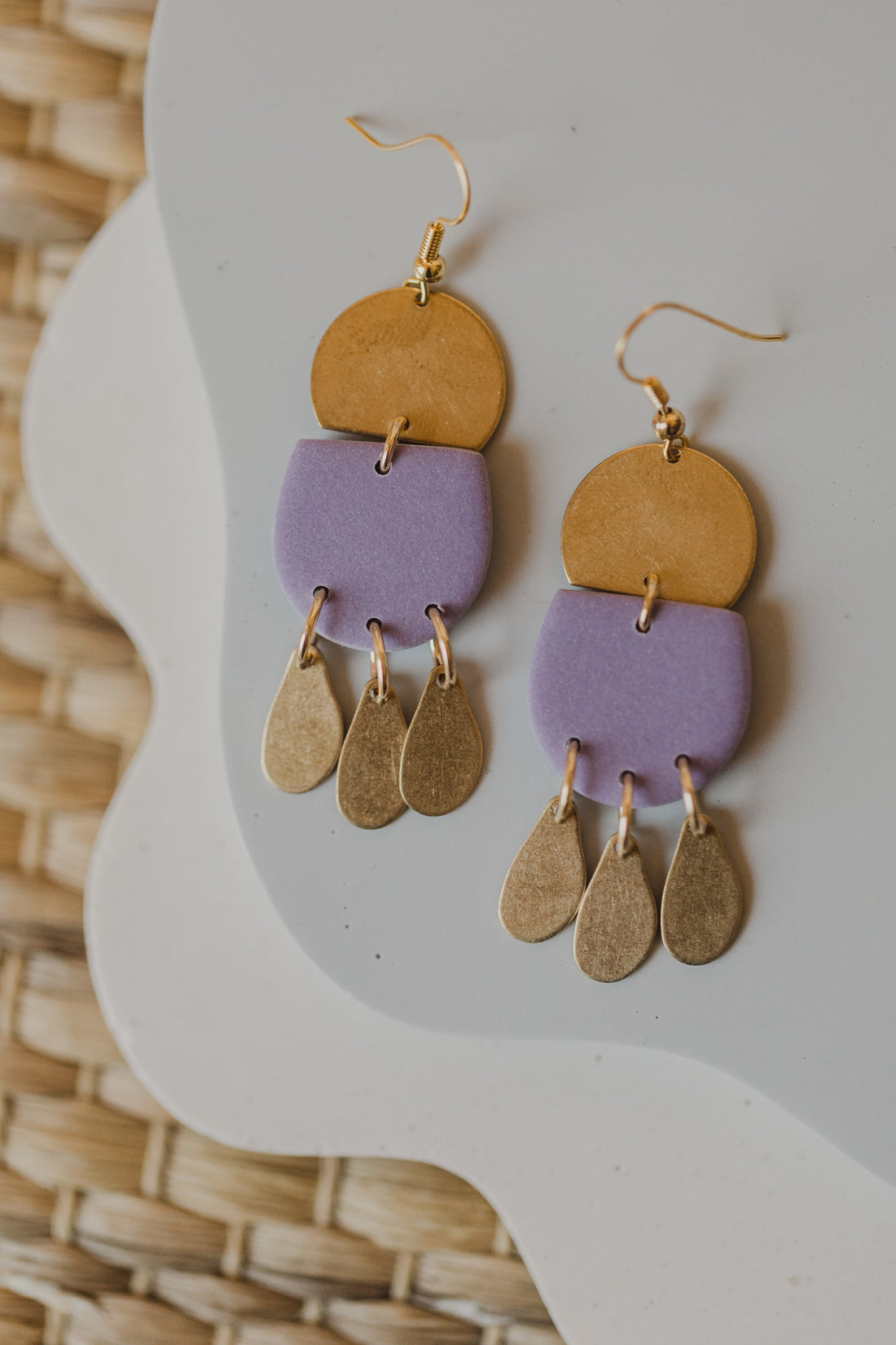 Polymer clay earrings in the color light purple