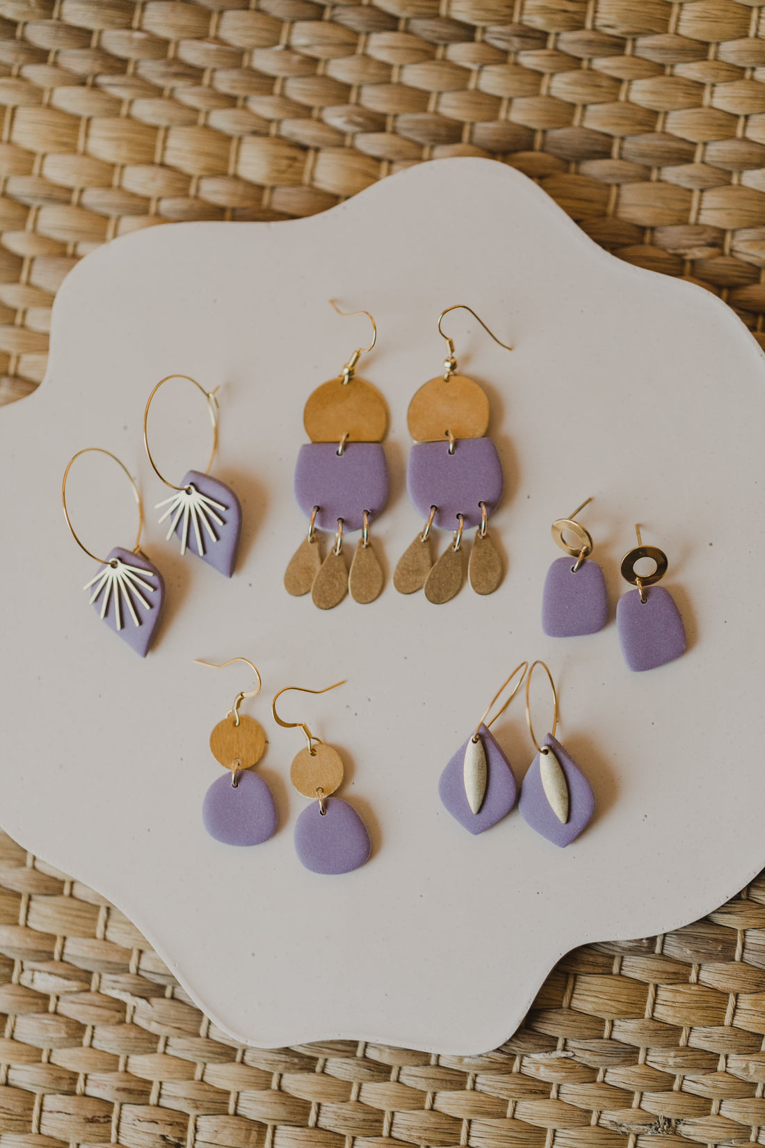 Polymer clay earrings in the color light purple