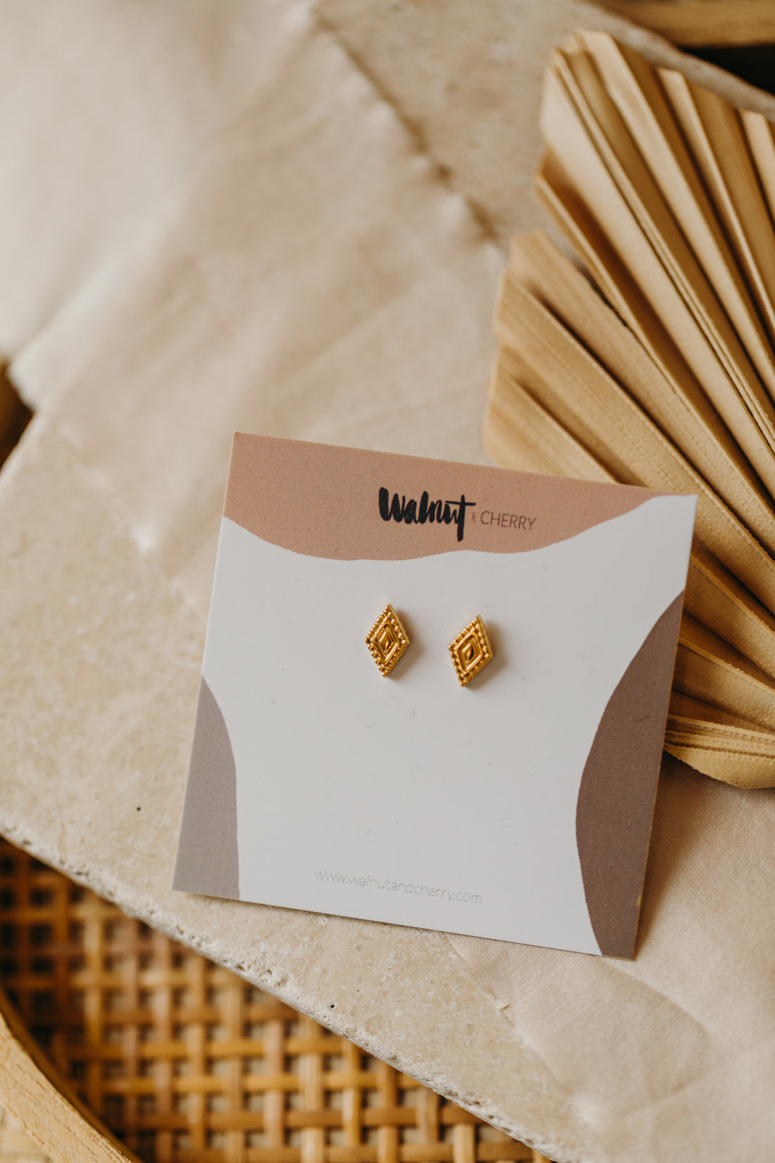 small eye earrings