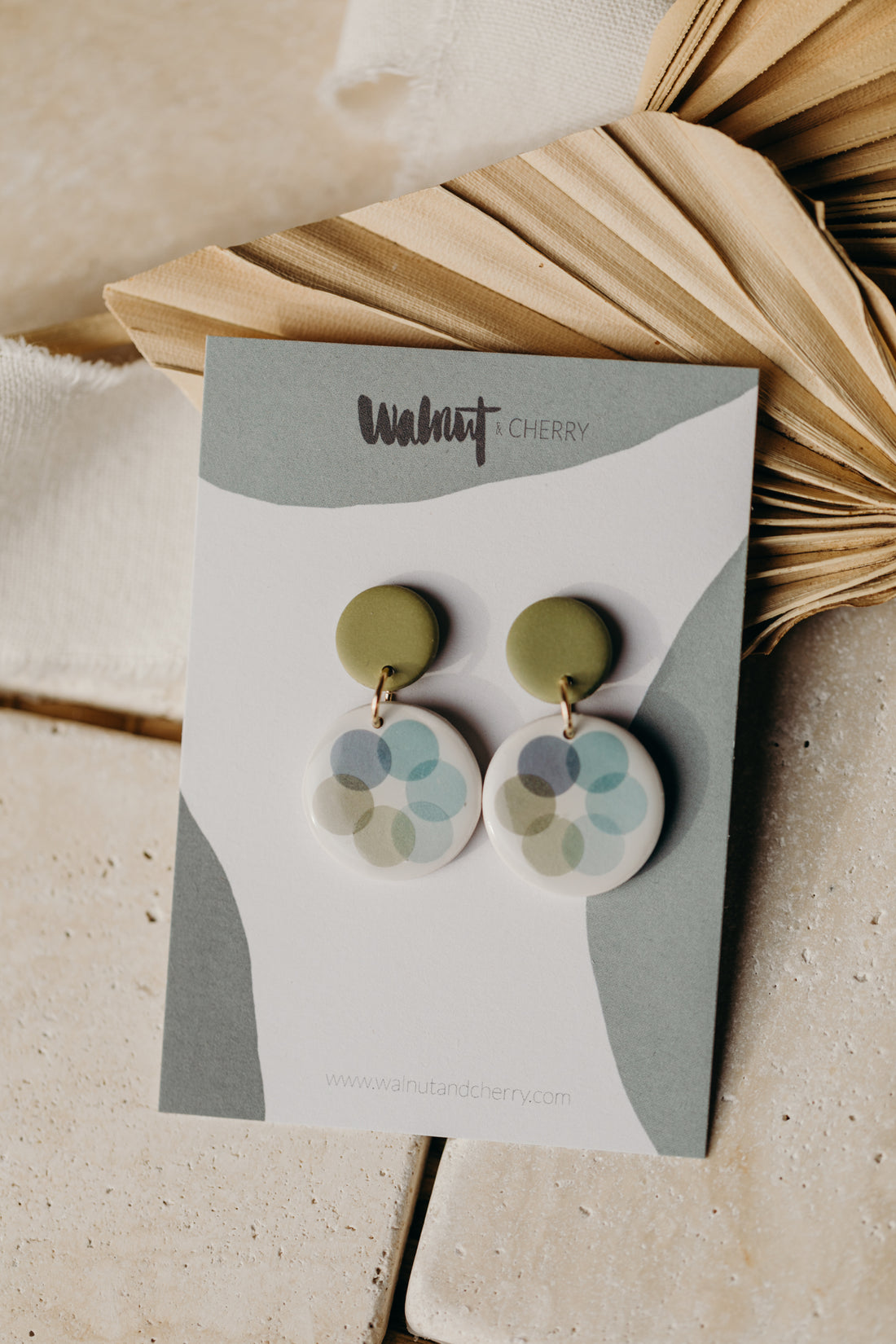 MARLA - round green polymer clay earrings with blue and green dots