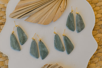 Hoop earrings with round polymer clay pendant and leaf