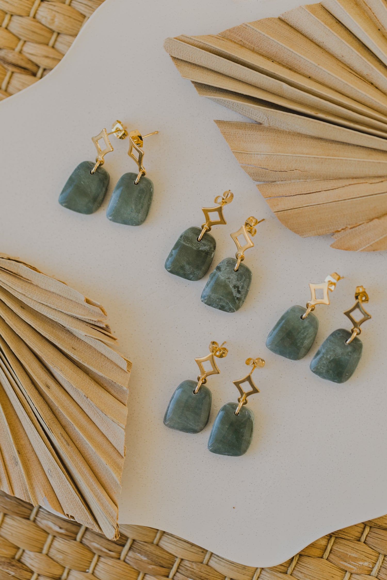 Hoop earrings with round polymer clay pendant and leaf