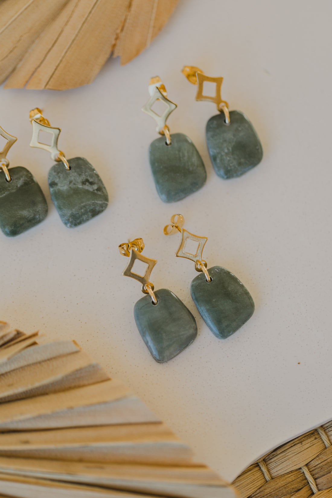 Hoop earrings with round polymer clay pendant and leaf