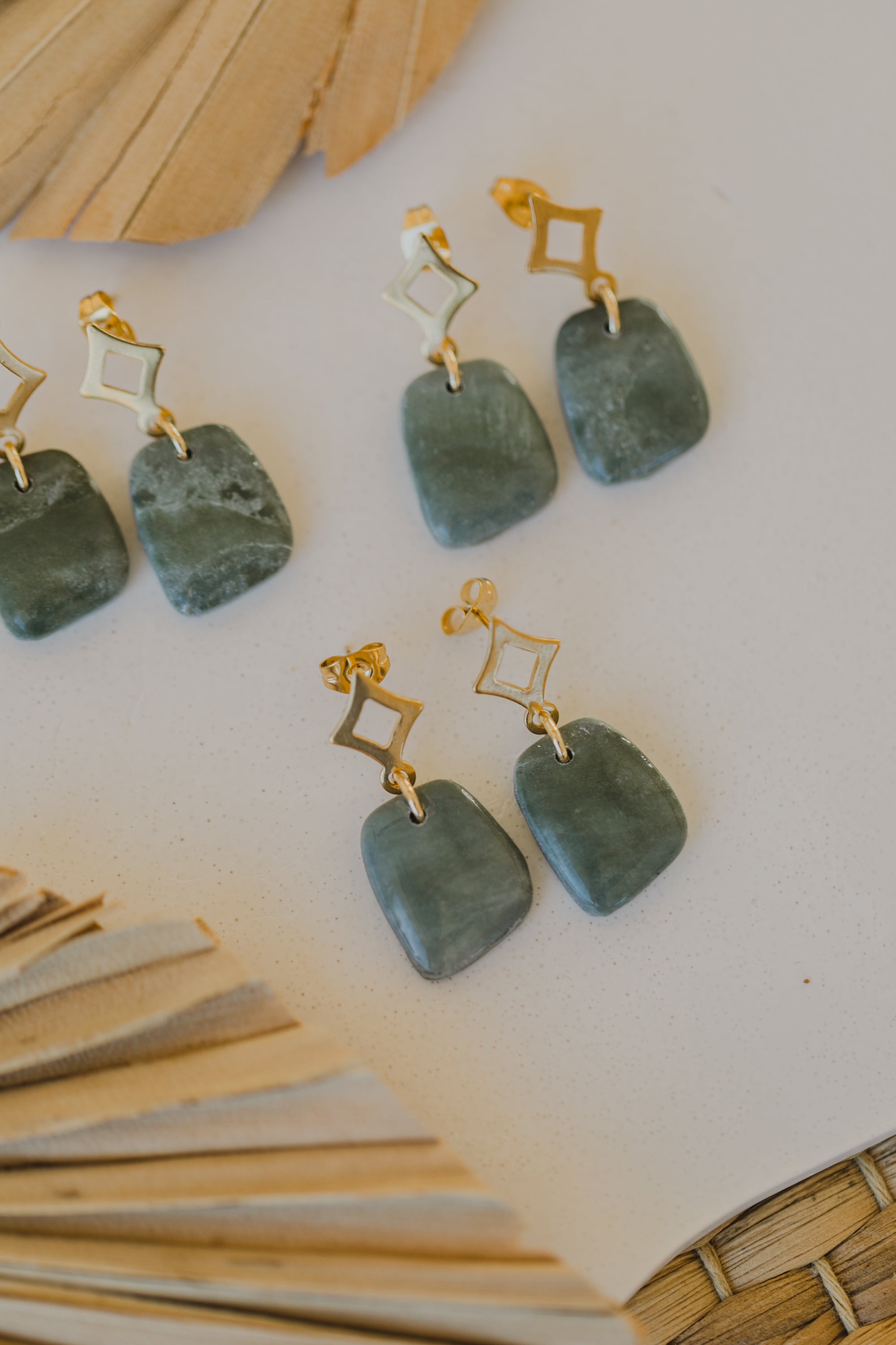 Hoop earrings with round polymer clay pendant and leaf