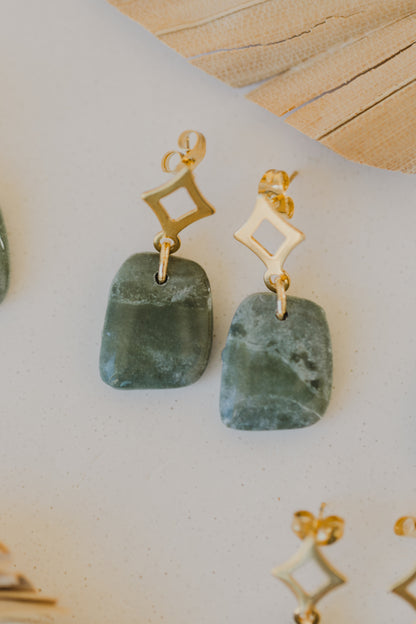 Hoop earrings with round polymer clay pendant and leaf