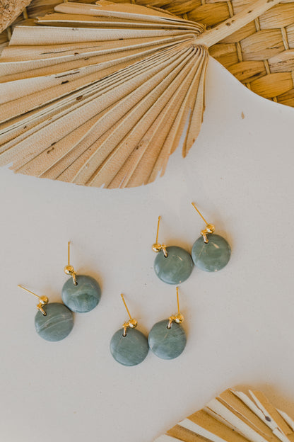 Hoop earrings with round polymer clay pendant and leaf