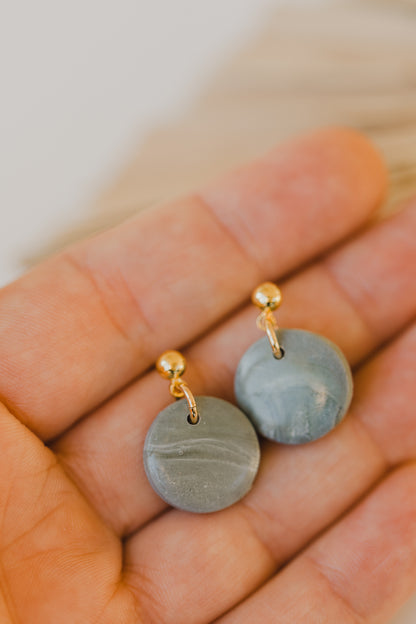Hoop earrings with round polymer clay pendant and leaf