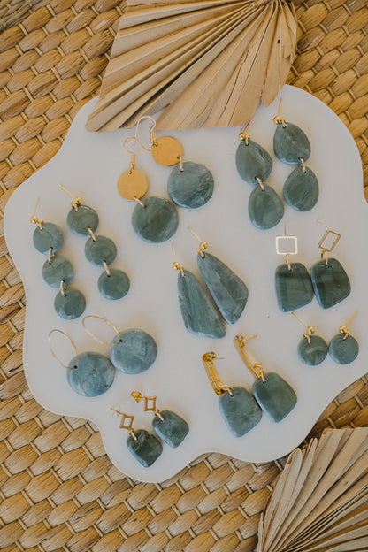 Hoop earrings with round polymer clay pendant and leaf