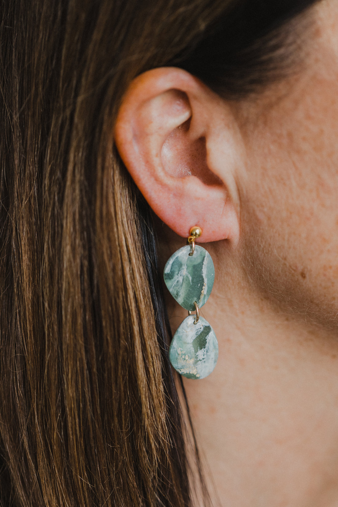 Polymer clay earrings in light green