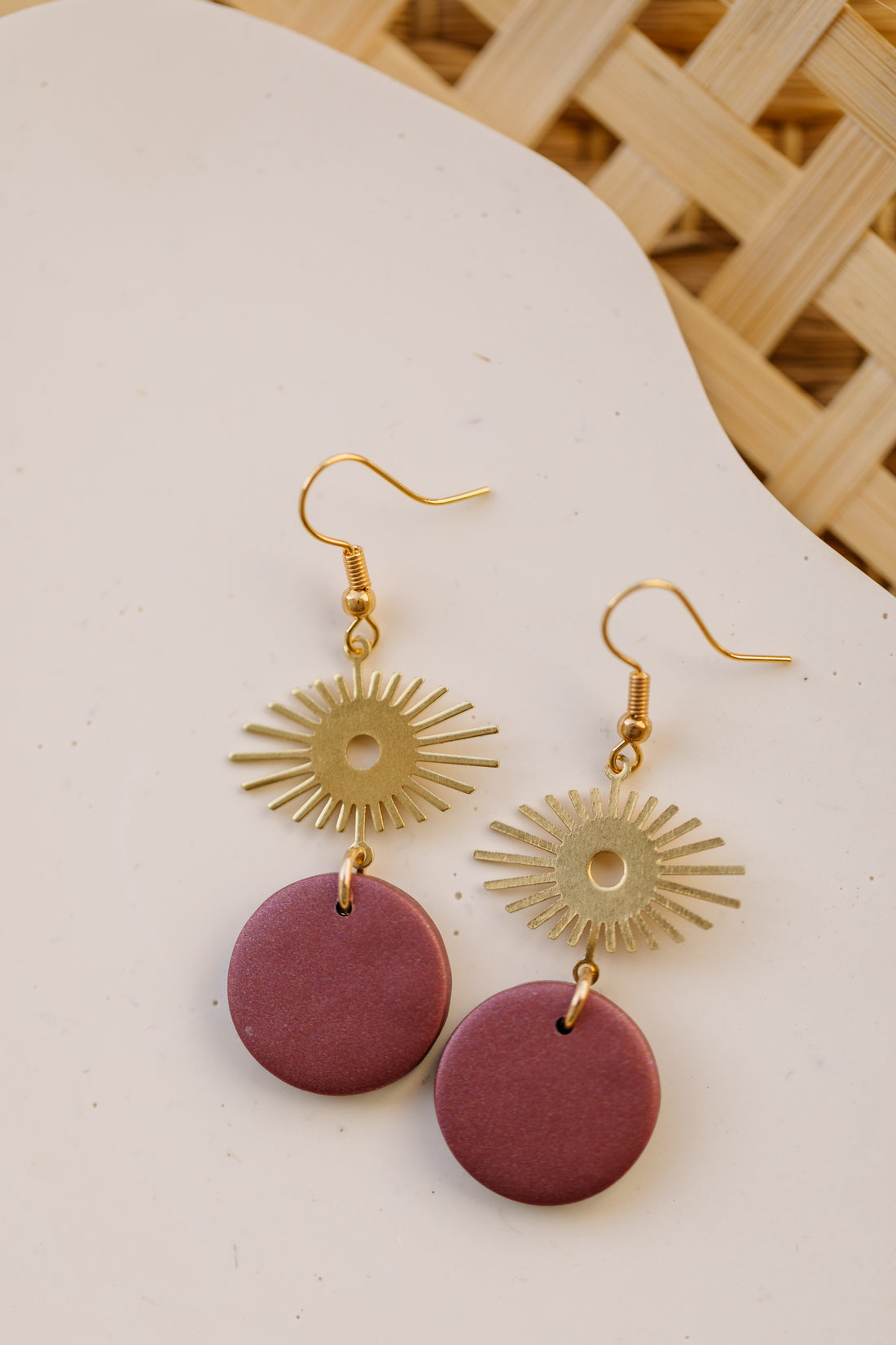 golden earrings with acrylic in white, petrol and brown