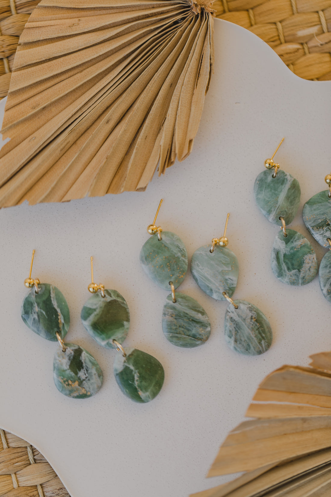 Polymer clay earrings in light green
