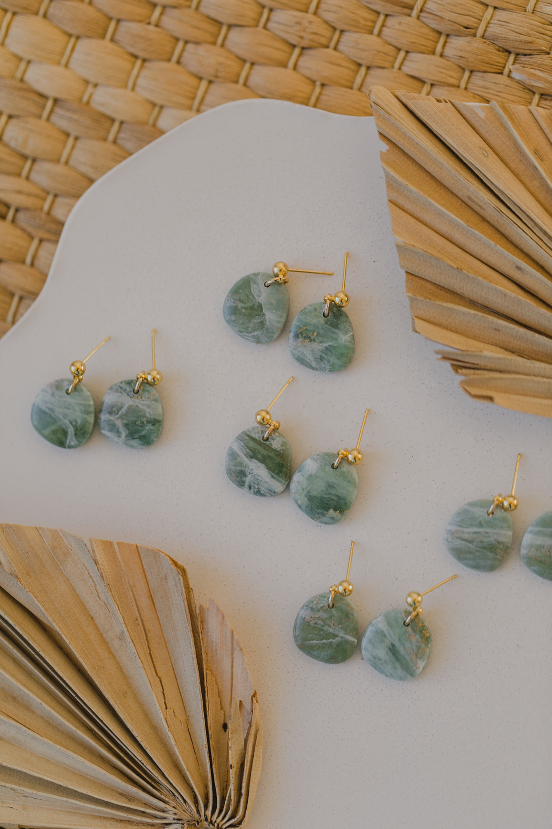 Polymer clay earrings in light green