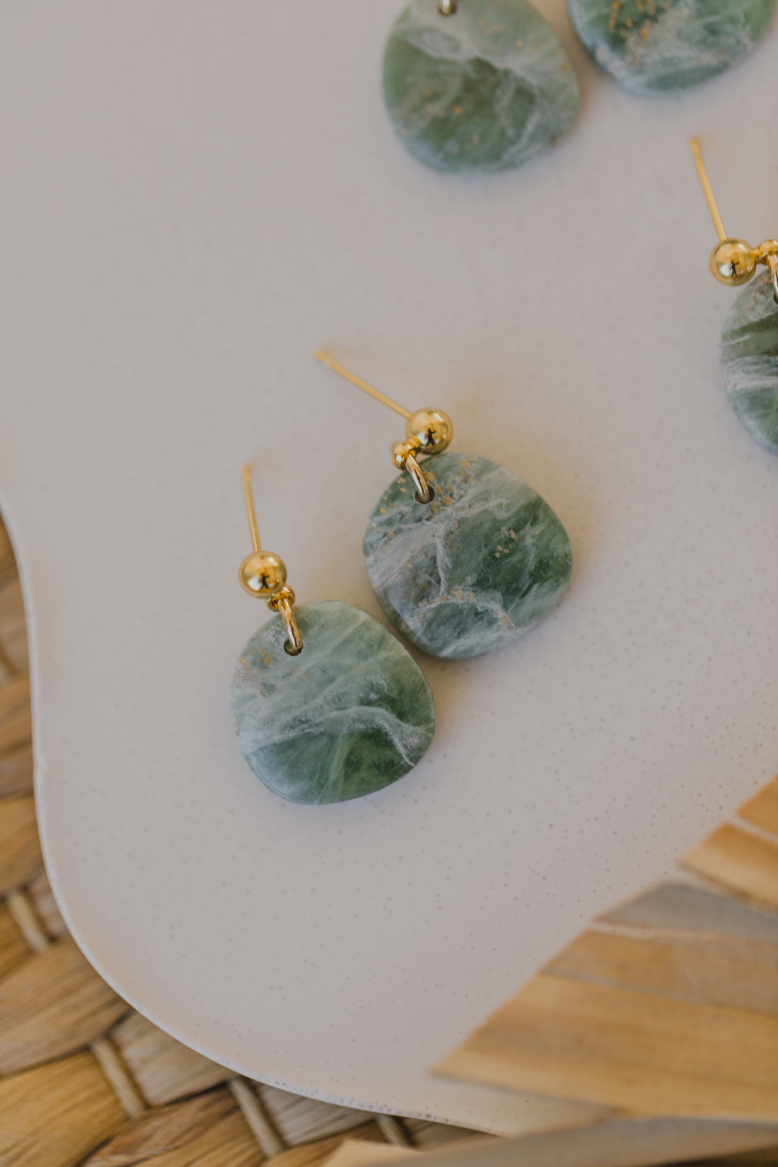 Polymer clay earrings in light green