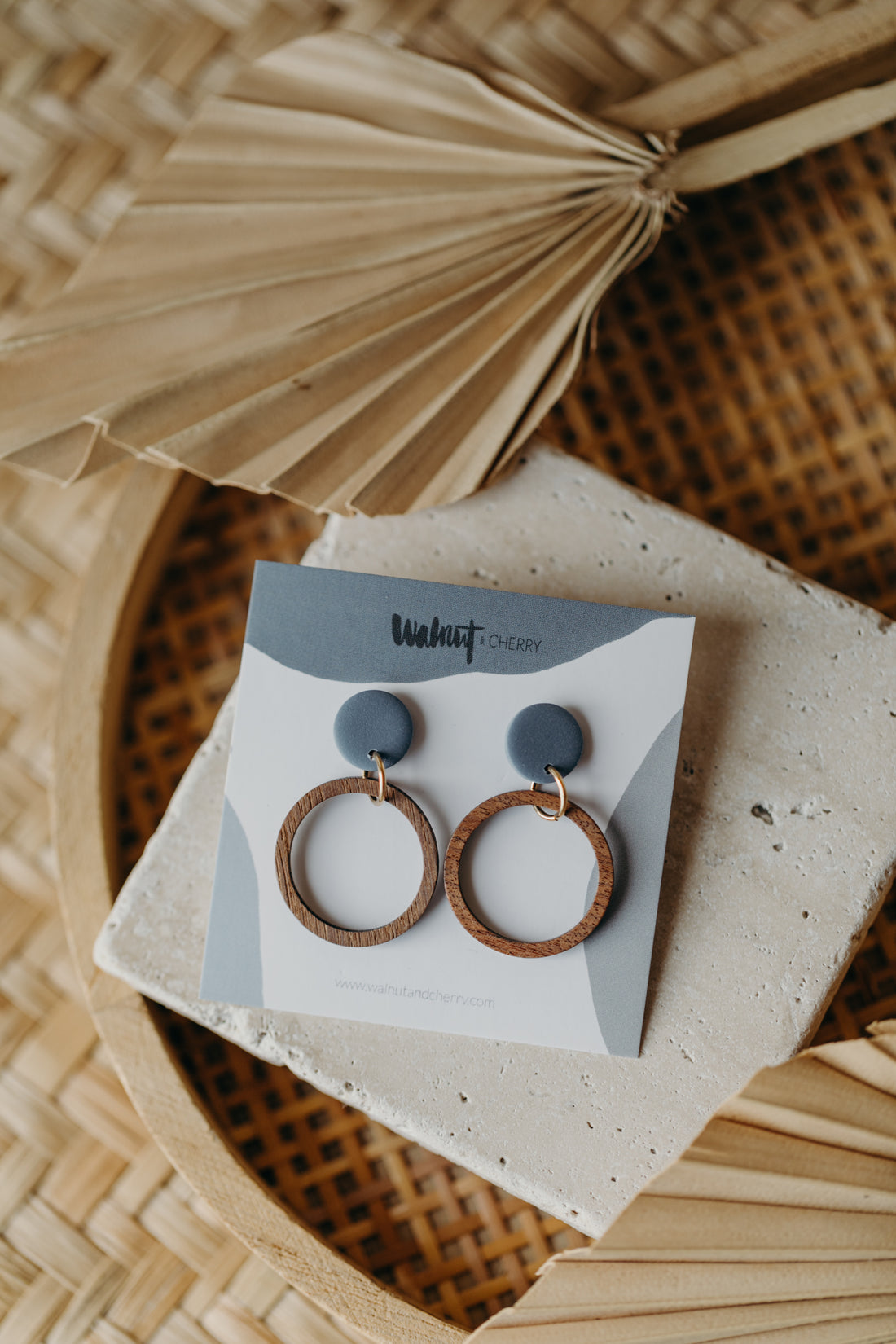 round polymer clay earrings in pastel blue with wooden pendant small circle