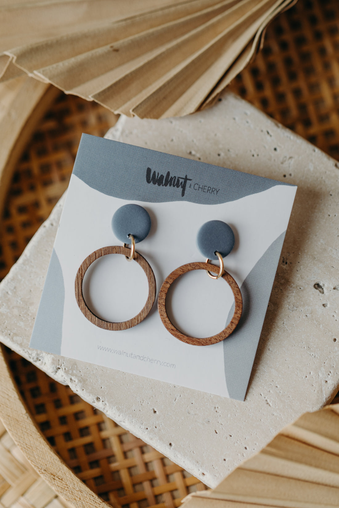 round polymer clay earrings in pastel blue with wooden pendant small circle