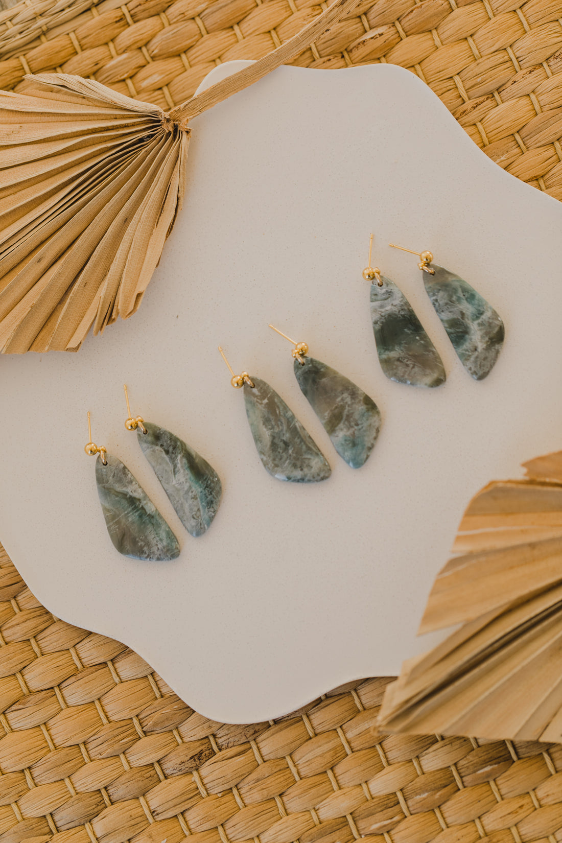 Hoop earrings with round polymer clay pendant and leaf