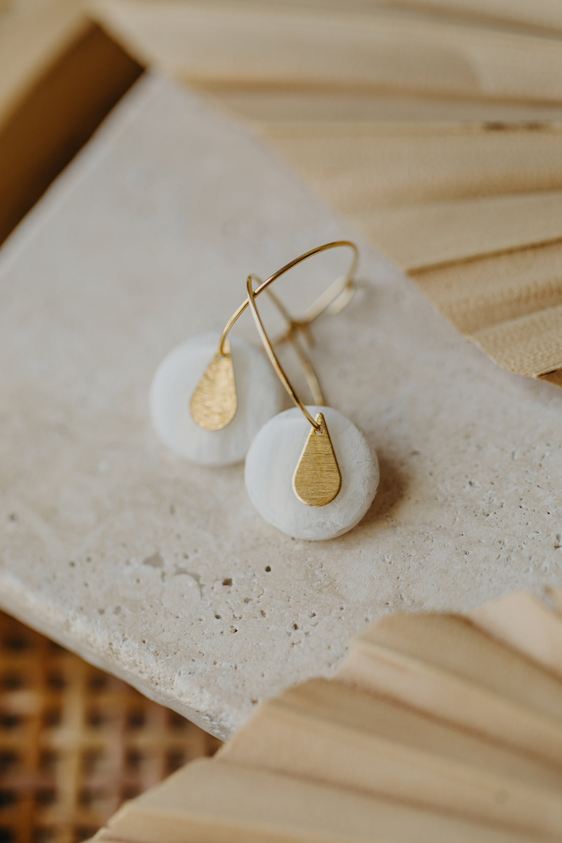 Hoop earrings with round polymer clay pendant and leaf
