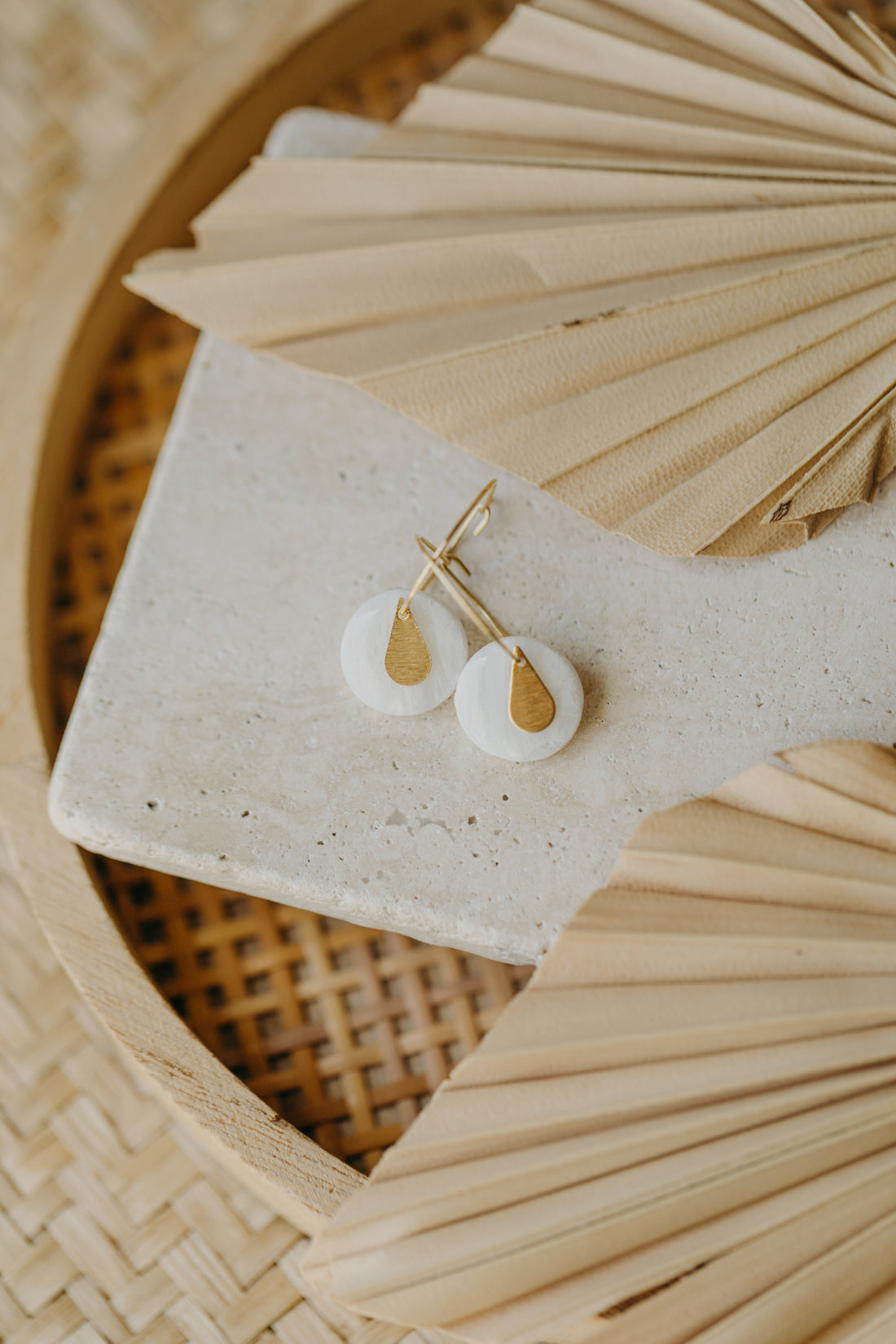 Hoop earrings with round polymer clay pendant and leaf