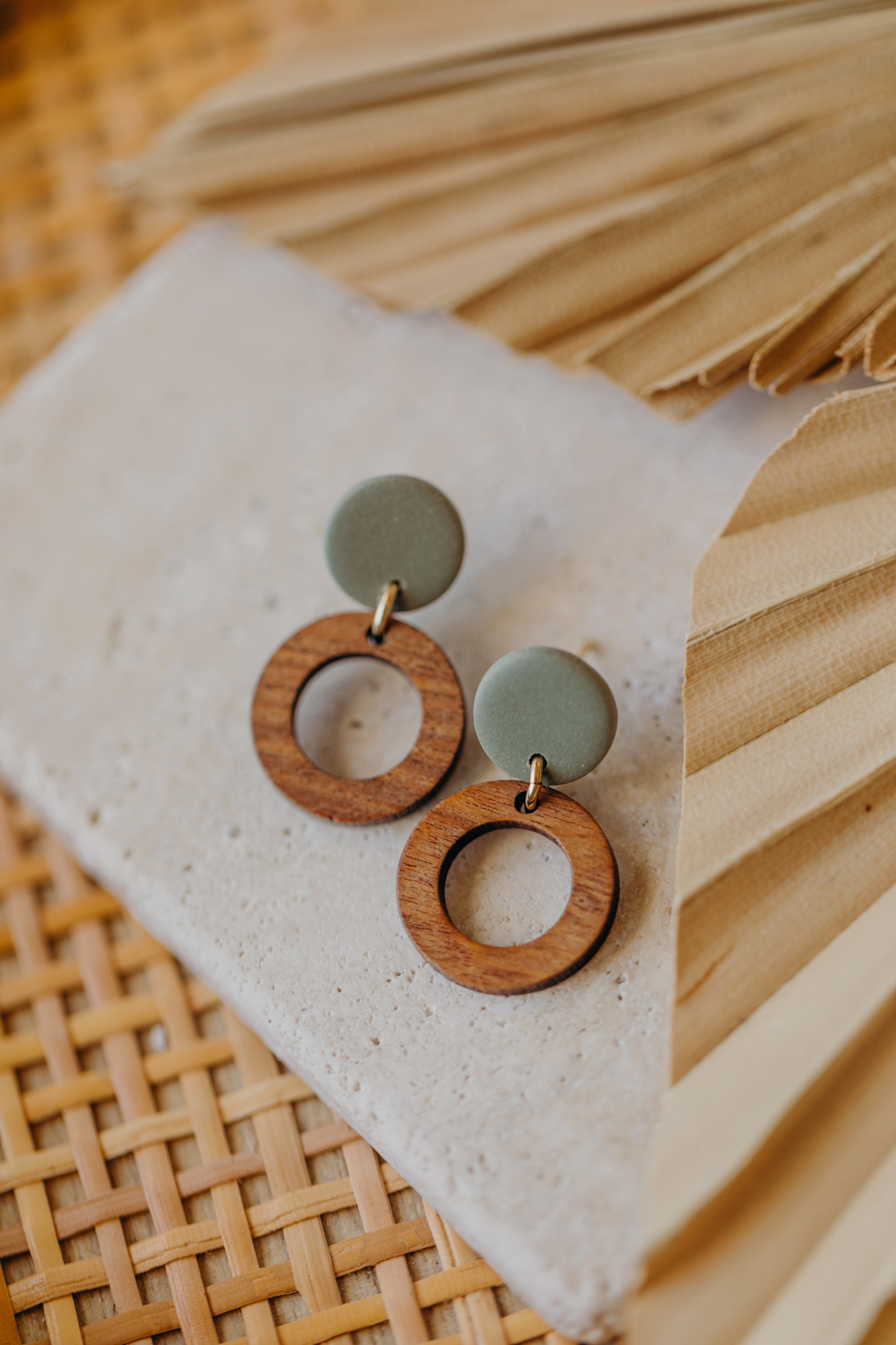 round polymer clay earrings in eucalyptus green with wooden pendant small circle