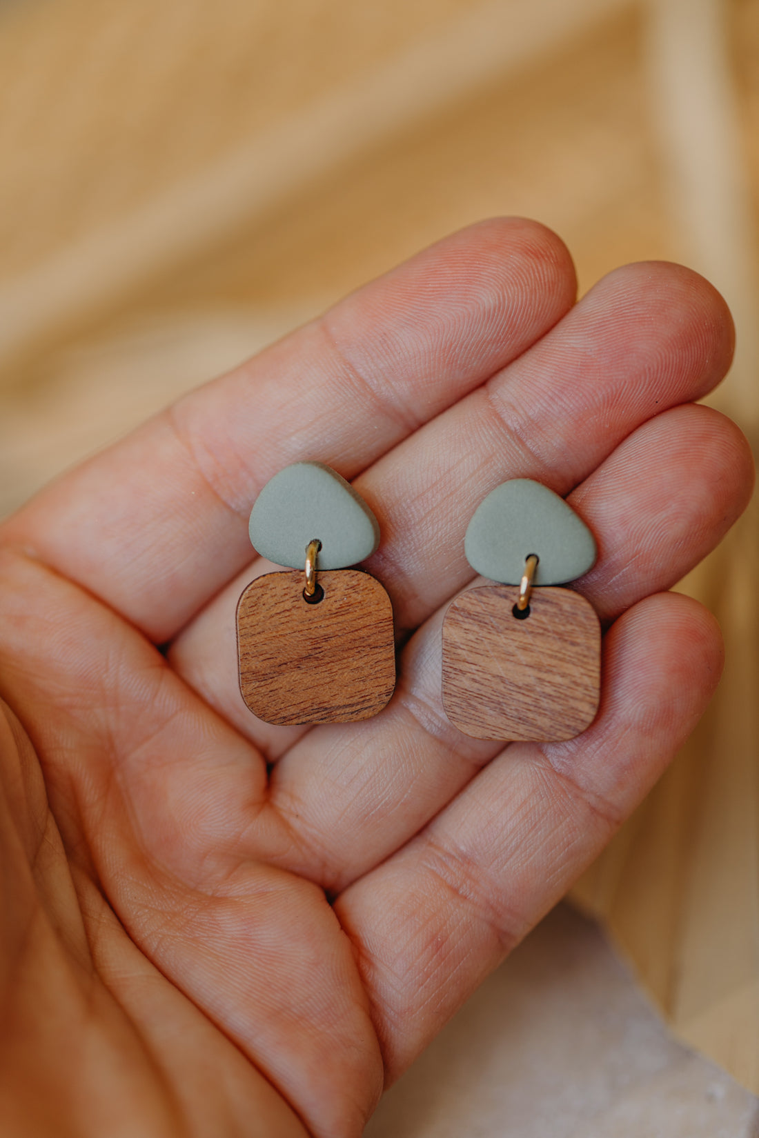 CARLA - triangular polymer clay earrings in eucalyptus green with rectangular wooden pendant