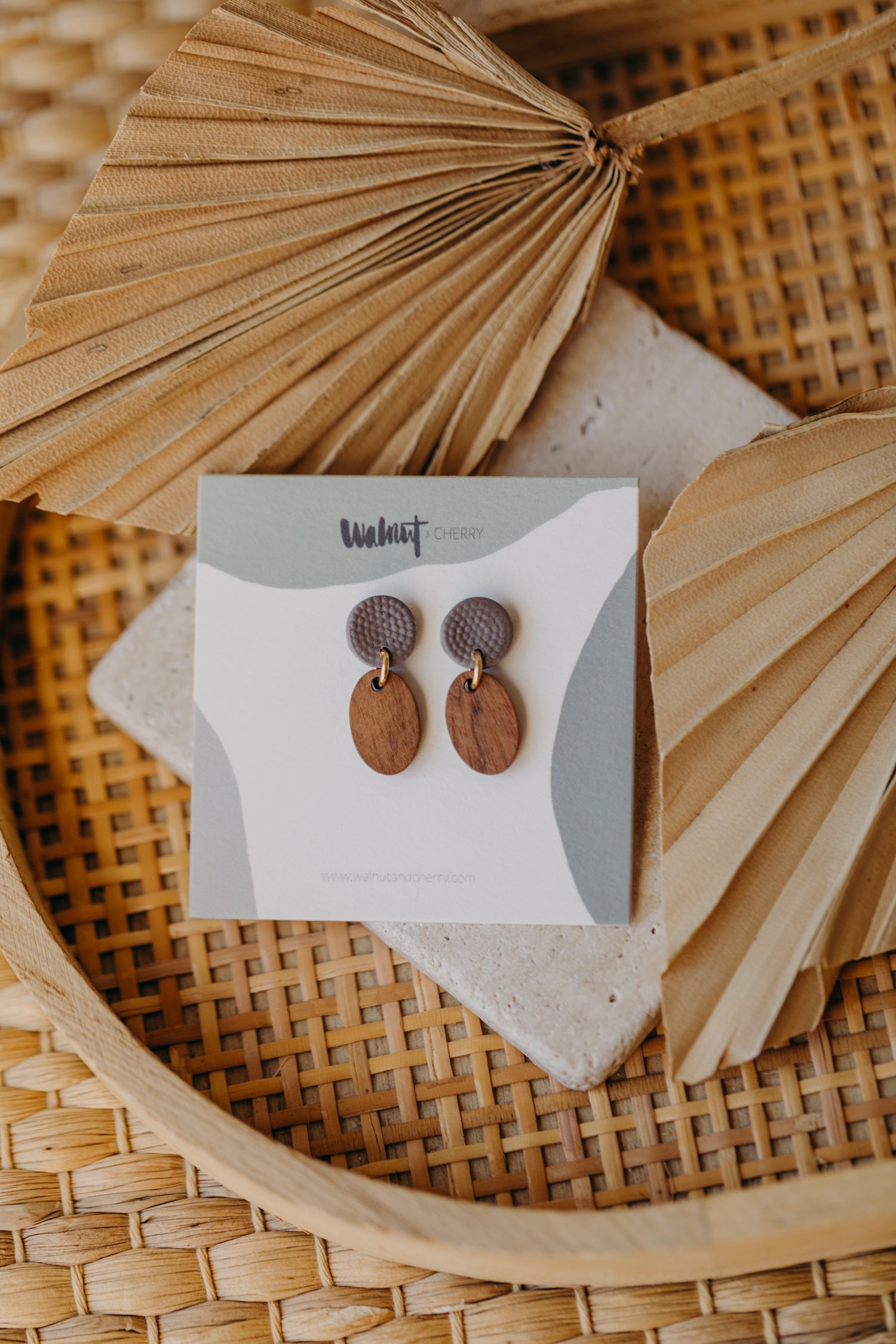round polymer clay earrings in mauve with oval wooden pendant