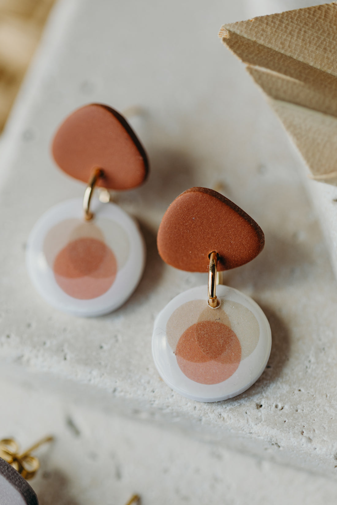 small polymer clay earrings with colorful dots