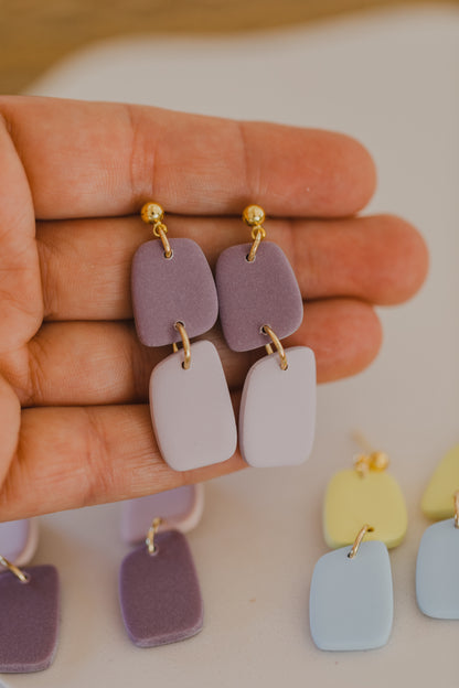 two-tone earrings made of polymer clay in pastel colors