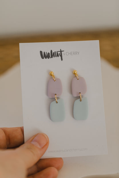two-tone earrings made of polymer clay in pastel colors