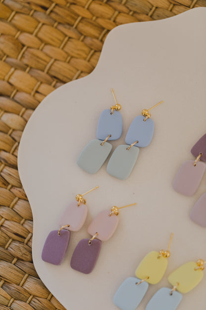 two-tone earrings made of polymer clay in pastel colors