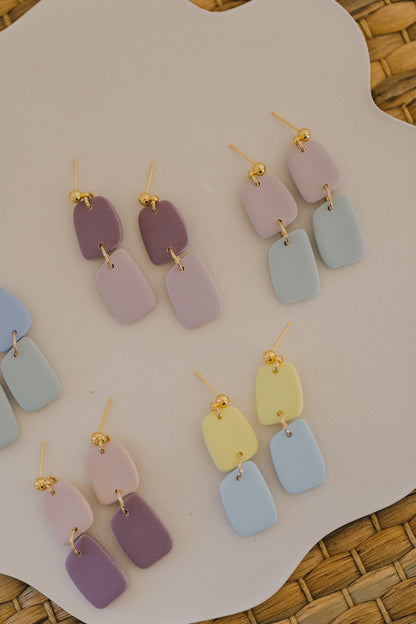 two-tone earrings made of polymer clay in pastel colors