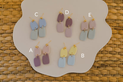 two-tone earrings made of polymer clay in pastel colors