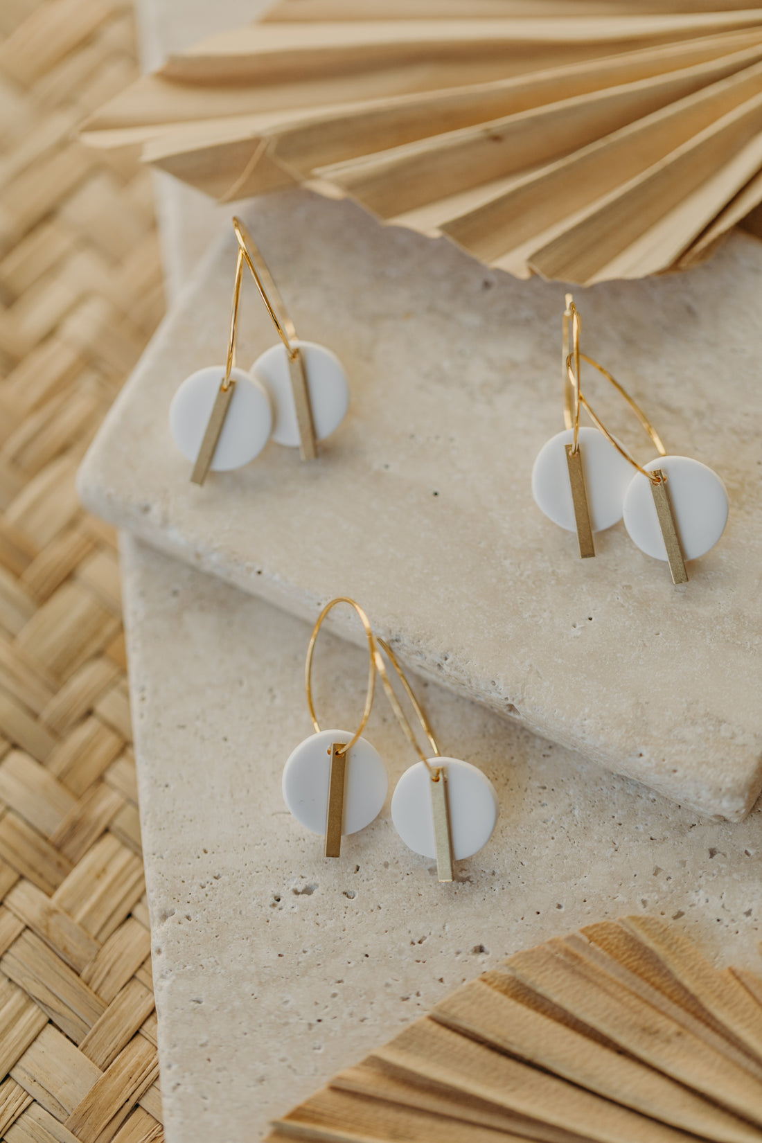 Hoop earrings with round polymer clay pendant and leaf
