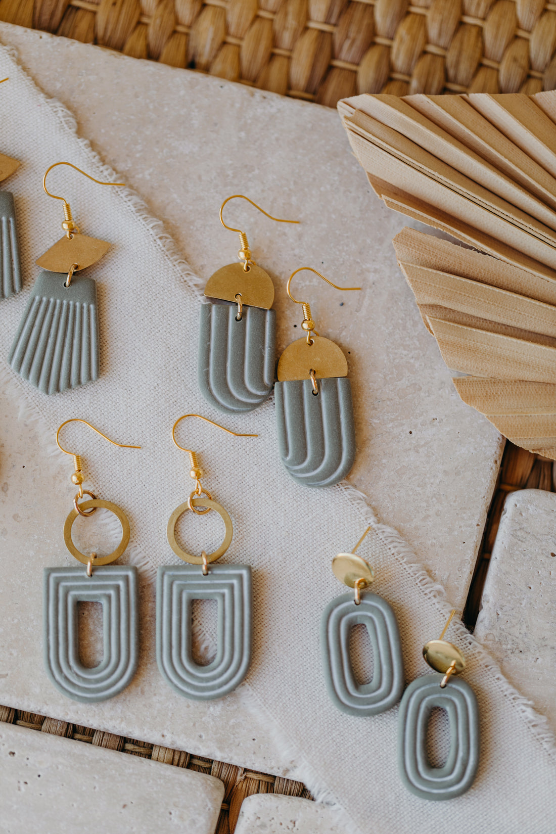 eucalyptus green polymer clay earrings with white lines