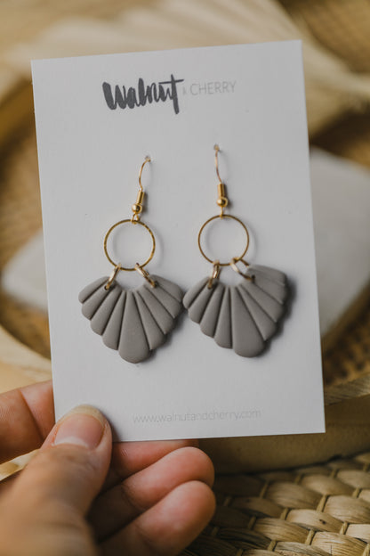 Hoop earrings with round polymer clay pendant and leaf