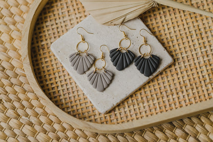 Hoop earrings with round polymer clay pendant and leaf