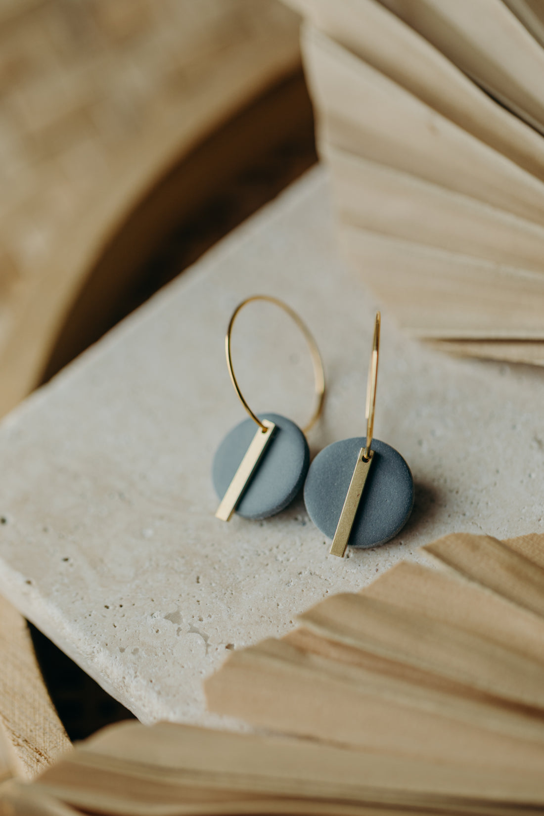 Hoop earrings with round polymer clay pendant and leaf