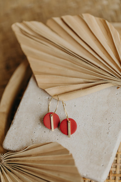 Hoop earrings with round polymer clay pendant and leaf