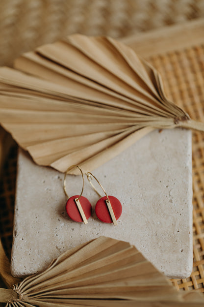 Hoop earrings with round polymer clay pendant and leaf