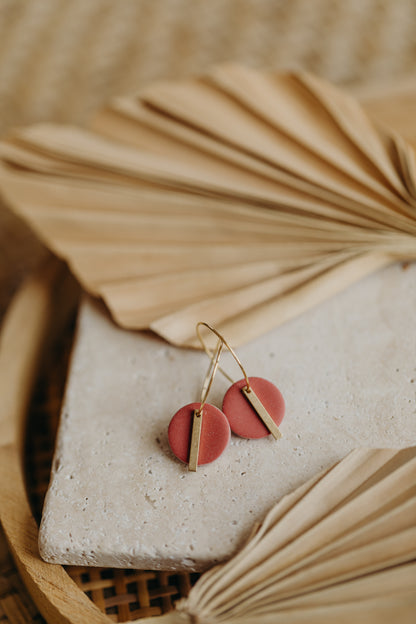 Hoop earrings with round polymer clay pendant and leaf