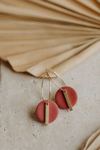 Hoop earrings with round polymer clay pendant and leaf