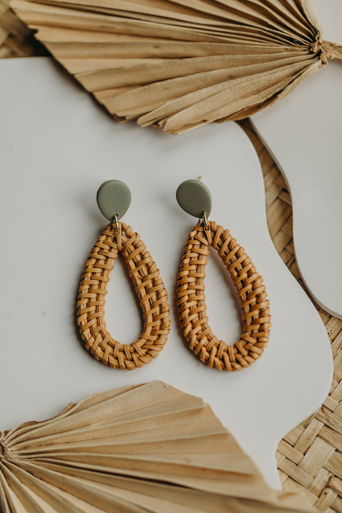 blue polymer clay earrings with rattan pendant drops