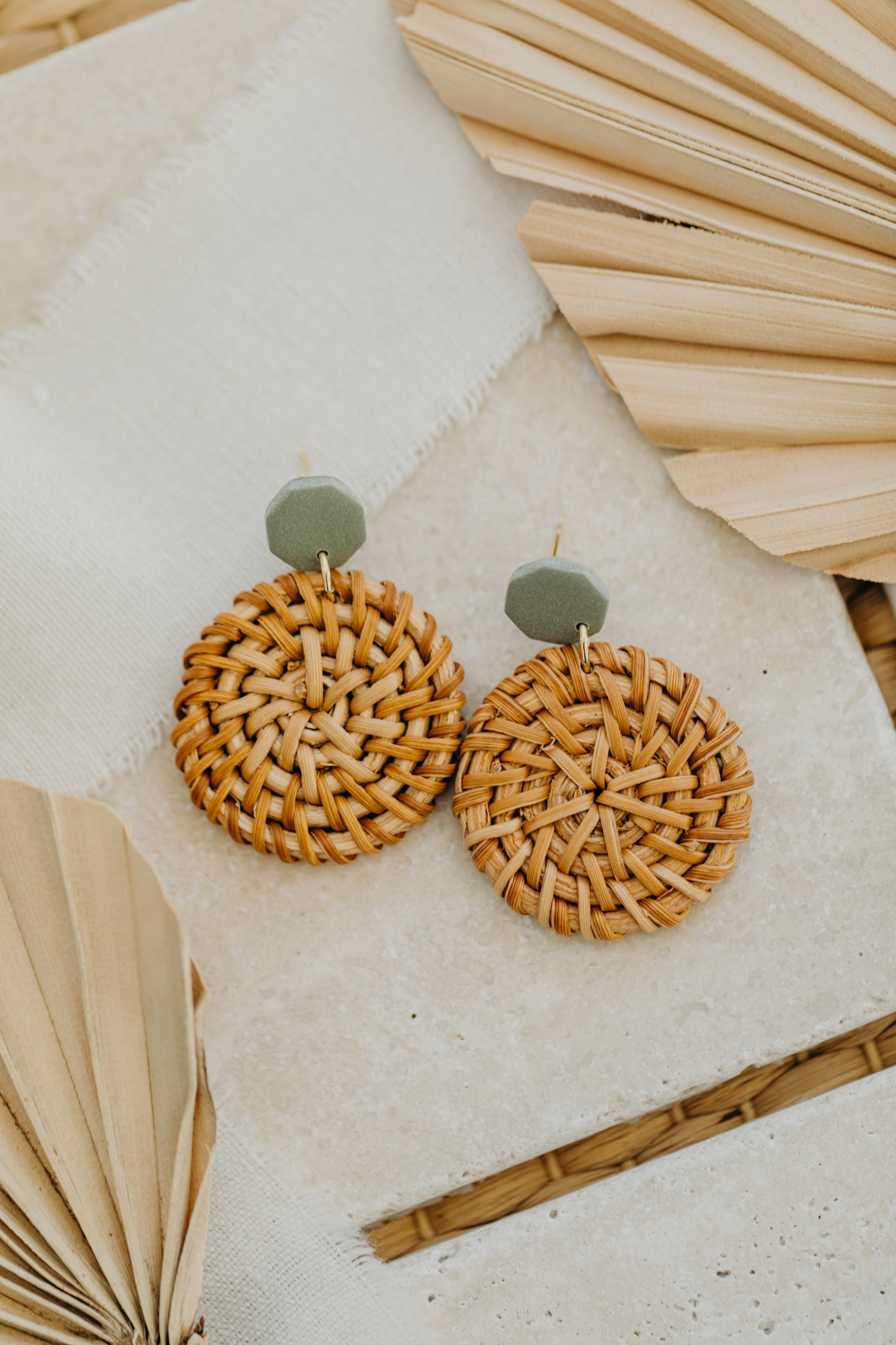 Eucalyptus green polymer clay earrings with round rattan pendant