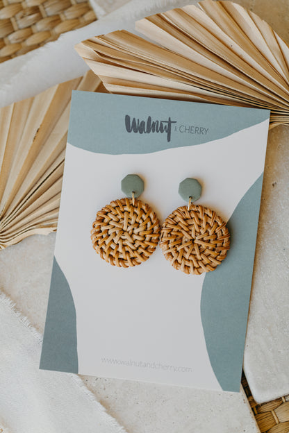 Eucalyptus green polymer clay earrings with round rattan pendant