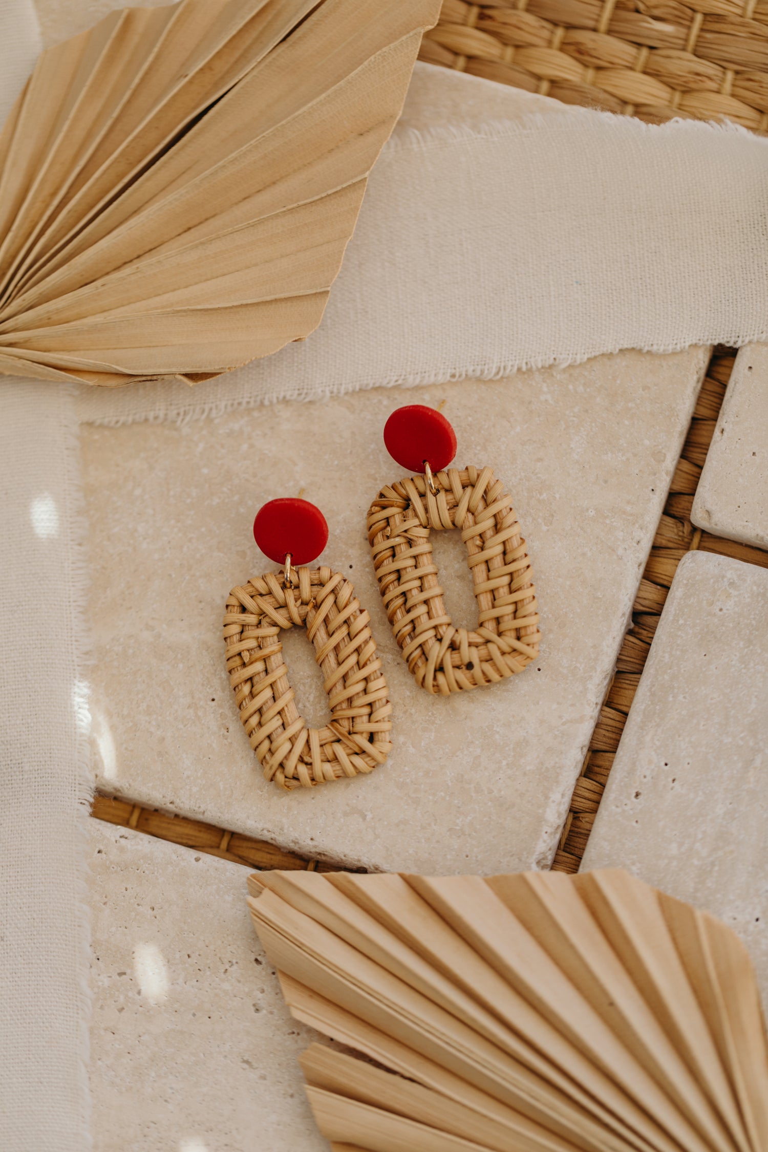 round polymer clay earrings in red with rattan pendant rectangle