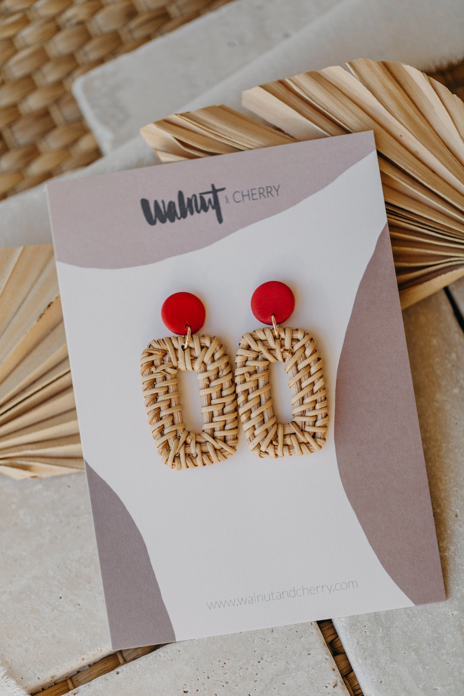 round polymer clay earrings in red with rattan pendant rectangle
