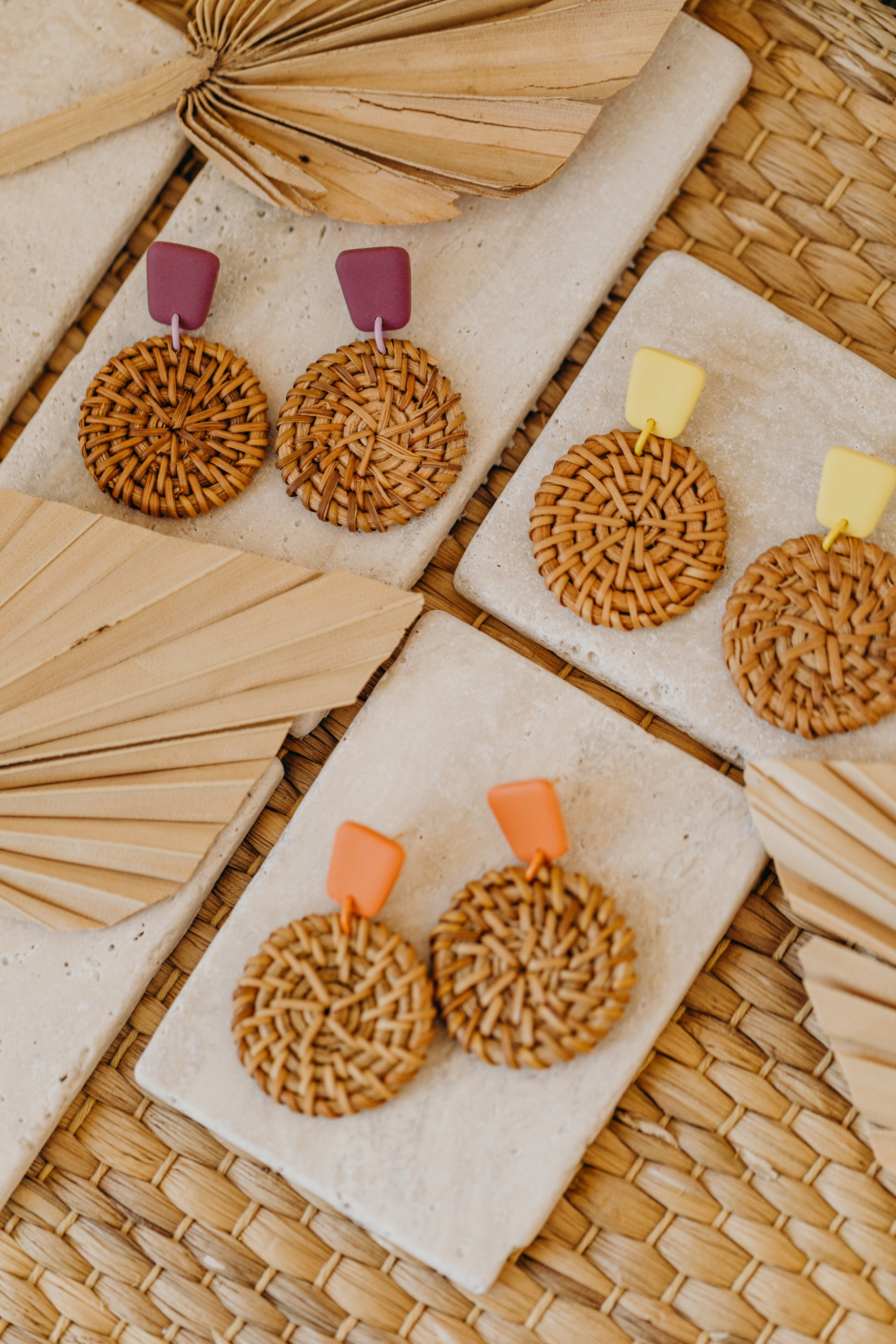 square polymer clay earrings in orange with round rattan pendant