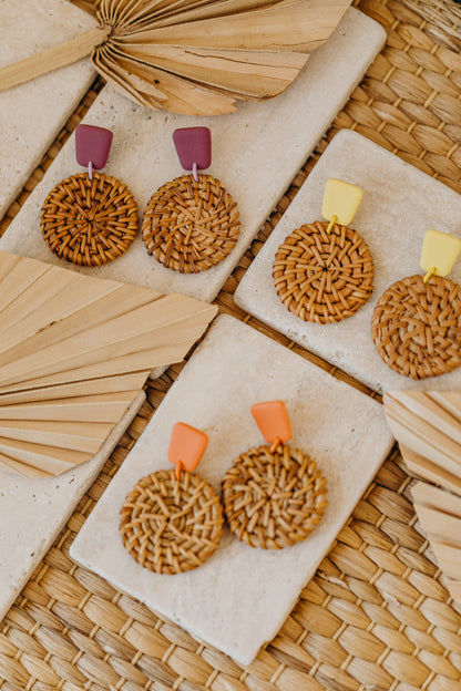 square polymer clay earrings in orange with round rattan pendant