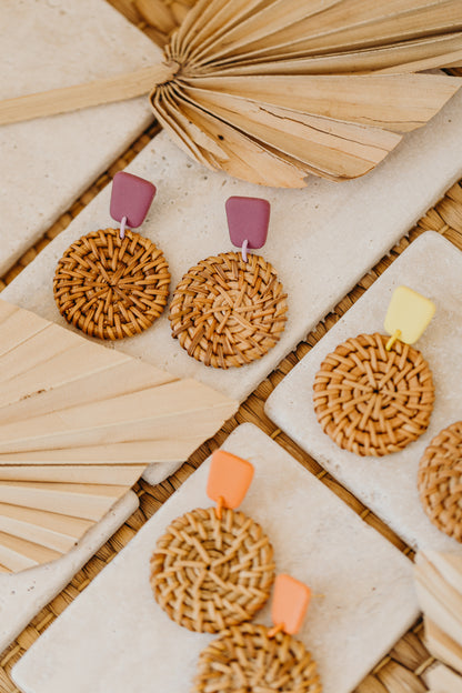 square polymer clay earrings in fuchsia with round rattan pendant