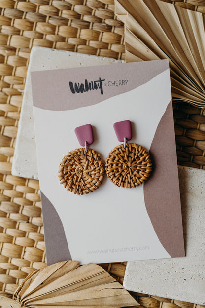 square polymer clay earrings in fuchsia with round rattan pendant